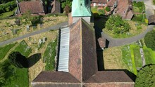 Reveal Shot Of The Green Spire Of The Village Church In Barham In Kent, UK