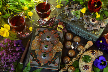 Wall Mural - Still life with magic book of spells, runes and wand on witch table. Occult, esoteric and witchcraft concept. Mystic background with vintage objects