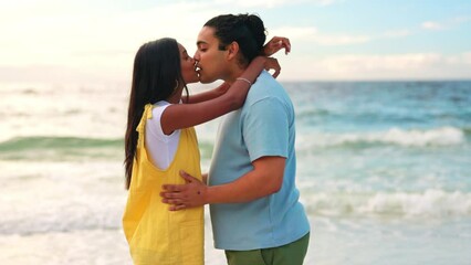 Sticker - Hug, holiday and couple with love, beach and quality time with sunset, relationship and romantic gesture. Romance, man or happy woman embrace, seaside and dating with commitment, loving and happiness