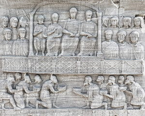 Wall Mural - Submission of the barbarians scene at the hippodrome of Constantinople. Marble relief of west face of pedestal of the Obelisk of Theodosius (series). Sultan Ahmet square, Istanbul, Turkey