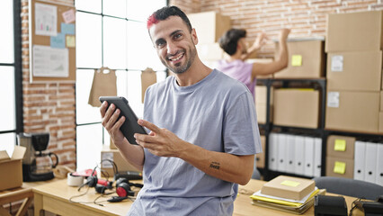 Canvas Print - Two men ecommerce business workers using touchpad working at office