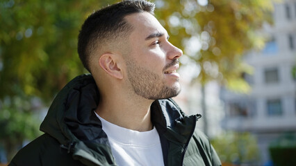 Sticker - Young hispanic man smiling confident standing at park