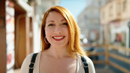 Sticker - Young redhead woman smiling confident standing at street