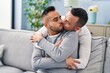 © Krakenimages.com - Two men couple hugging each other kissing at home