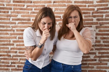 Sticker - Hispanic mother and daughter wearing casual white t shirt feeling unwell and coughing as symptom for cold or bronchitis. health care concept.