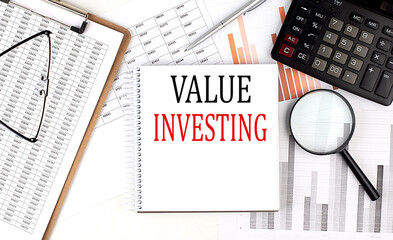 Poster - VALUE INVESTING text on notebook with clipboard and calculator on a chart background