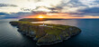 Sunset over Mull of Galloway Lighthouse from a drone, Mainland Scotland, UK