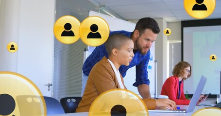 Poster - Animation of profile icon in circles over diverse coworkers discussing reports on laptop at office