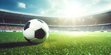 Fototapeta Sport - Fußball auf einem Sportplatz mit blauen Himmel und Sonnenschein 