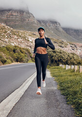 Poster - Fitness, black woman running and mountain in forest background for exercise. Workout or health wellness, motivation and body of female athlete training run for marathon in nature with sportswear