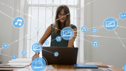 Poster - Animation of network of digital icons against thoughtful caucasian woman using laptop at office