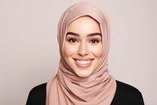 Portrait Of Beautiful Young Muslim Woman With Hijab Smiling On Grey Background