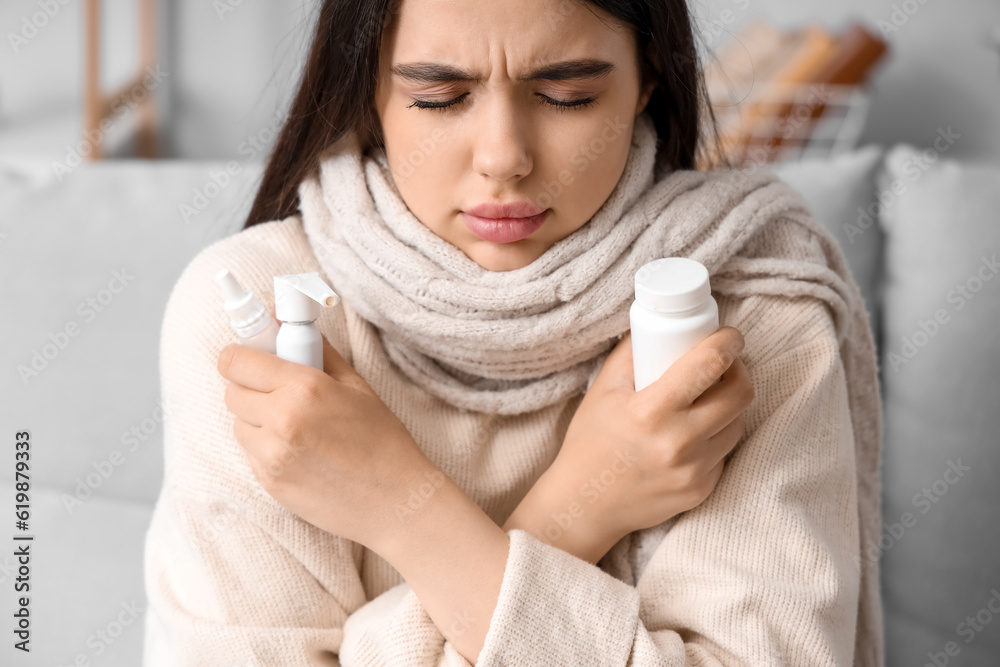 Sick woman with remedies at home