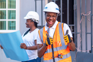 African engineer doing thumbs up