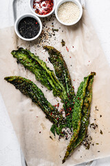 Wall Mural - Sesame kale chips directly above, healthy vegan snack