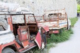 Fototapeta Na sufit - Wreckage Collide: A Tale of Two Dilapidated Vehicles