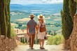 © MVProductions - Tuscany, Italy travel destination. Tourist couple on sunny day looking at beautiful landscape and distant villages. Generative AI.
