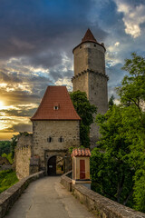 Wall Mural - Sunset dramatic sky view of Zvikov medieval castle gate and keep with attacking angle in Bohemia