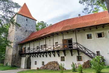 Wall Mural - Inner courtyard, second gate tower, gothic building with wooden balcony at Zvikov medieval castle in Czechia