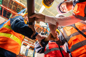 Wall Mural - Group of diverse industrial worker work together in manufacturing plant. 