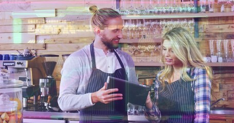 Canvas Print - Animation of computer language over caucasian coworkers discussing over digital tablet in restaurant