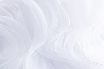 A chic wedding background for your text. White large silk ruffles of factory fabric parts of the bride's wedding dress.