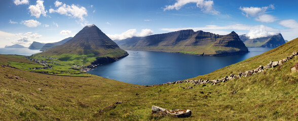 Canvas Print - Beautiful mountain scenery with the majestic Malinsfjall mountain and Viðareiði settlement on the Viðoy the northern-most island of the Faroe Islands. Fugloy, Svínoy and Borðoy in the background.