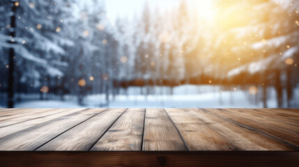 Empty dark wooden table and snow blurred background