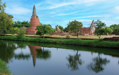 Ruins of old Buddha and temple of Ayuthaya historical park in Ayuthaya Thailand. UNESCO site. Travel concept.