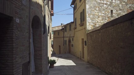 Wall Mural - Moving view of a medieval Tuscan village.