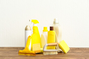 Wall Mural - Set of cleaning supplies on wooden table