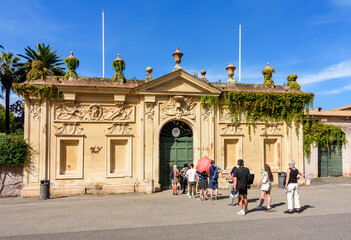 Wall Mural - Tourists in line to take a look at St. Peter's basilica in Vatican through keyhole on Knights of Malta square, Rome, Italy