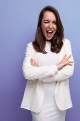 Wall Mural - positive energetic young brunette with long hair woman in white dress with hollywood smile