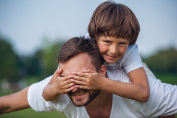 Wall Mural - Dad and son resting outdoors