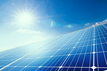 Wall Mural - solar panels reflect sparkling light from the sun on blue sky background, clean energy, and good env
