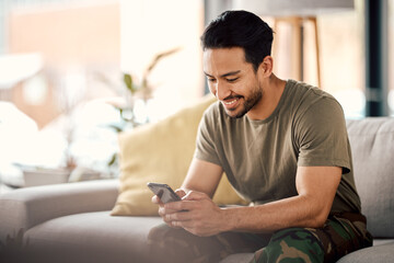 happy, man and texting on cellphone in living room for online mobile app, scroll social media and no