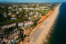 Aerial Drone View Of Vale Do Lobo Beach, Iconic Beachfront Resort And Home, Near Quarteira In Algarve, Portugal