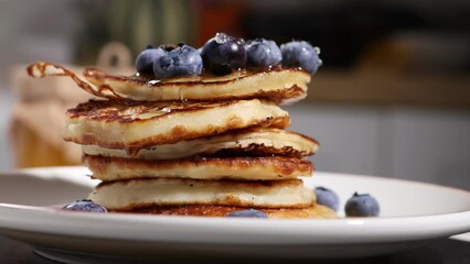 Canvas Print - rotation of pancakes with berrys and honey