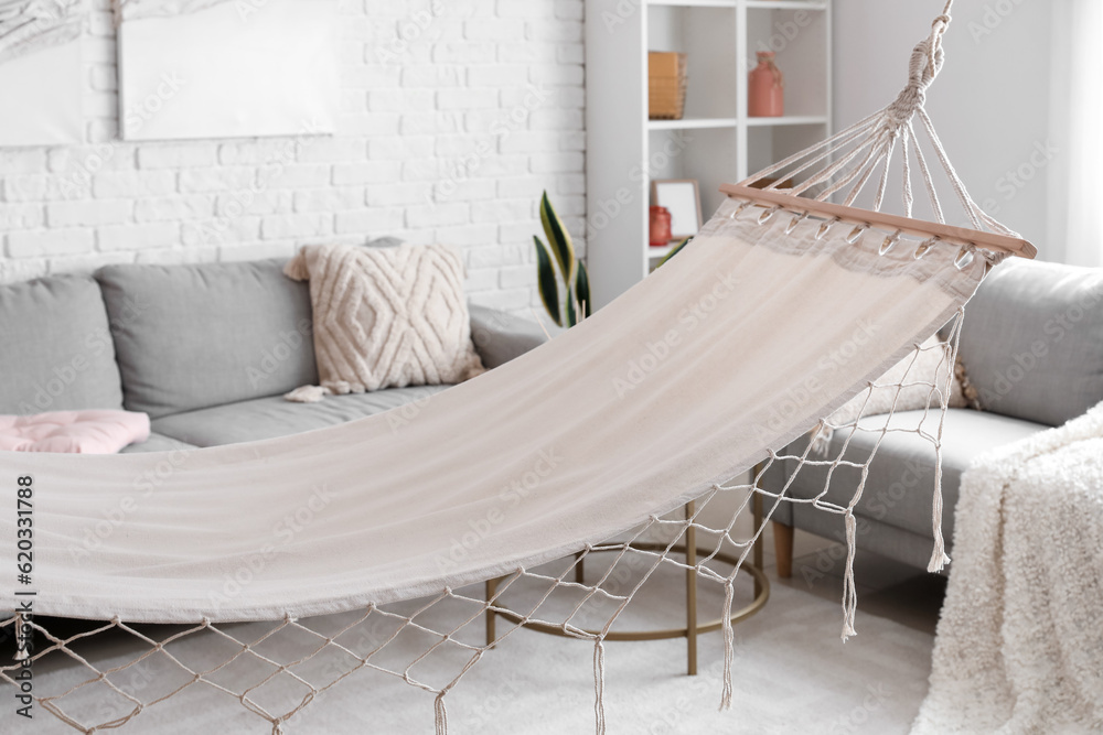 Cozy hammock in interior of light living room