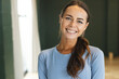 © Wavebreak Media - Portrait of happy caucasian woman in yoga studio