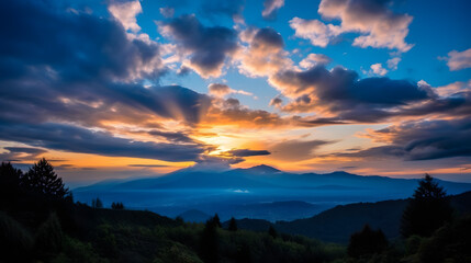 Wall Mural - sunset over the mountains background