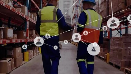 Poster - Animation of connected profile icons over rear view of caucasian workers walking amidst shelves