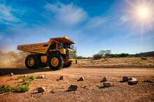Huge Yellow Mining Truck On A Dirt Road