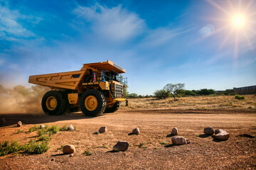 Wall Mural - huge yellow mining truck on a dirt road