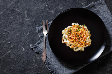 Wall Mural - cheesy green bean casserole on plate, top view