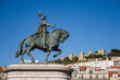 Statue of King John I and the Lisbon Castle