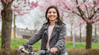 © Andrei - Close portrait of beautiful multi-ethnic Turkish woman 20-29s riding a bike in the city street