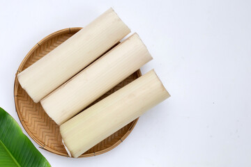 Banana stem for cooking on white background.