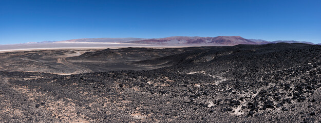 Argentina: Puna - off road adventure around Volcan Carachi Pampa, a surreal and beautiful landscape surrounded by a lagoon and a field of pumice - Panorama