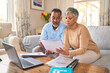 © Bettencourt/peopleimages.com - Laptop, documents and finance with a senior couple in the home living room for retirement or budget planning. Computer, accounting or investment savings with a mature man and woman in a house